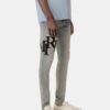 KADEMELİ LOGOLU SKINNY JEAN