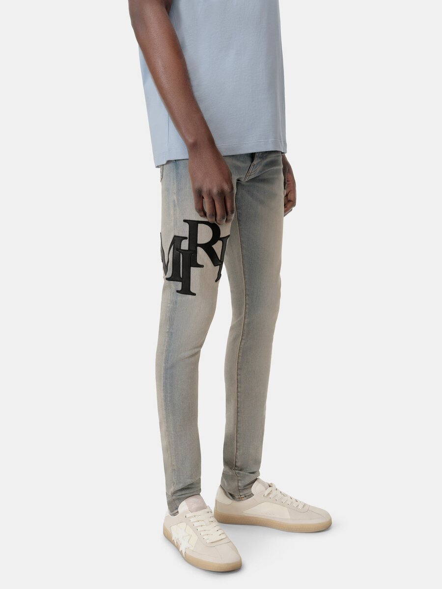 KADEMELİ LOGOLU SKINNY JEAN